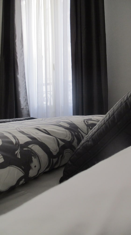 Habitación individual del hotel Cosy Monceau. Foto 1