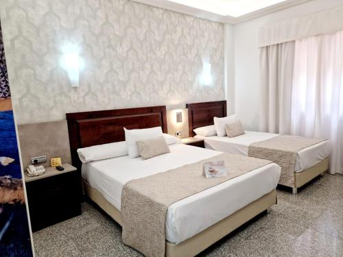 Habitación Familiar del hotel Plaza Del Castillo. Foto 4
