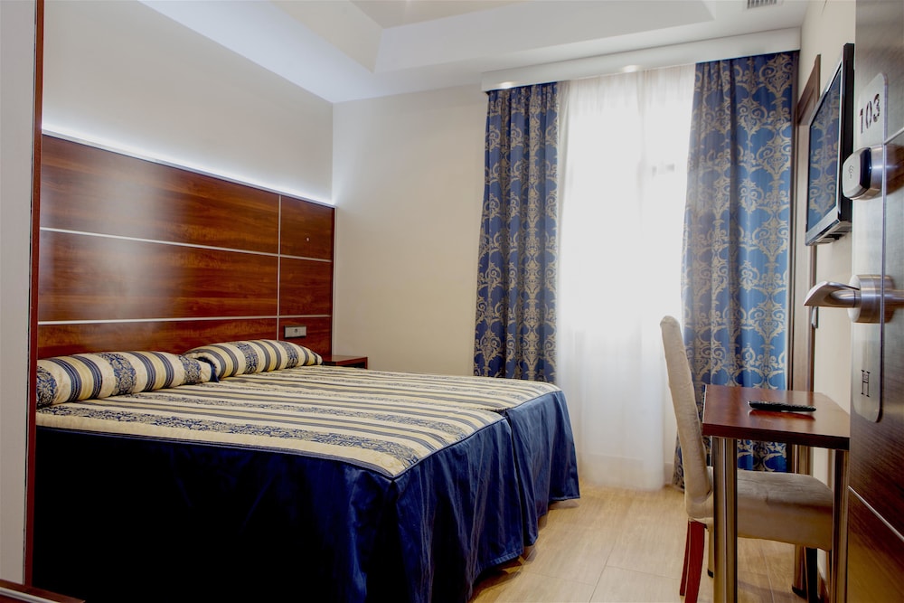 Habitación estándar, 2 camas individuales del hotel Castilla Guerrero. Foto 1