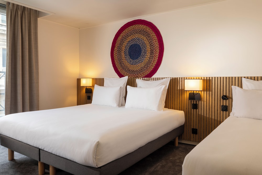 Habitación triple del hotel Louvre Marsollier Opéra
