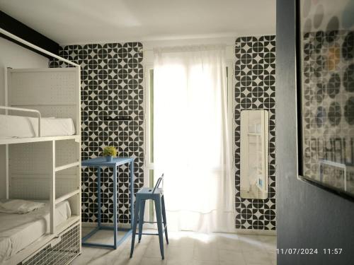 Habitación Cuádruple con baño privado del hotel Feel Hostels Soho Malaga