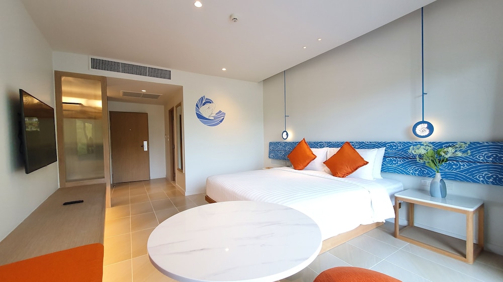 Habitación Premier 1 Cama King Size, Vistas al Jardín del hotel Novotel Rayong Rim Pae Resort. Foto 1