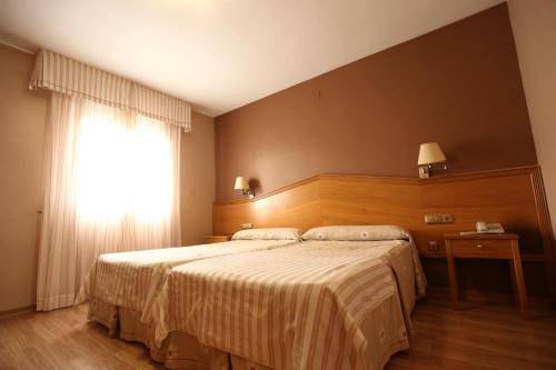 Habitación Doble con cama supletoria del hotel Anabel Baza