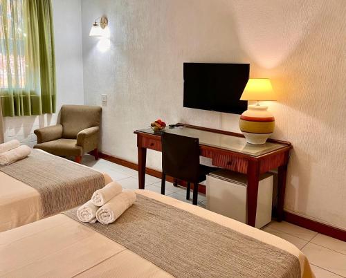 Habitación Cuádruple Clásica del hotel Atlantico Centro. Foto 4