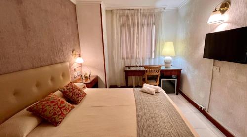 Habitación doble Económica 1 Cama doble del hotel Atlantico Centro. Foto 8