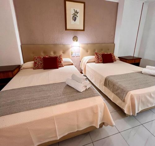 Habitación cuádruple 2 Camas dobles del hotel Atlantico Centro. Foto 5