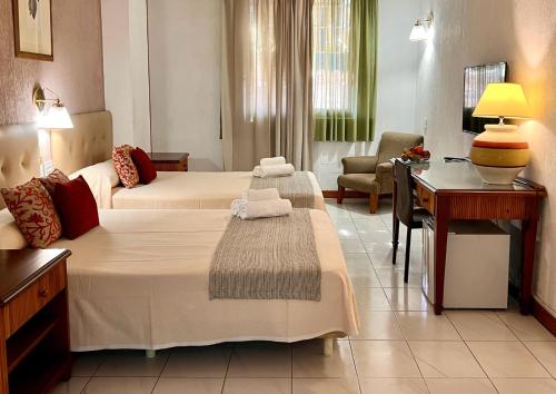 Habitación Cuádruple Clásica del hotel Atlantico Centro. Foto 6