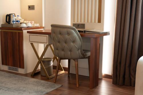 Habitación Triple Deluxe del hotel Golden Royal and Spa