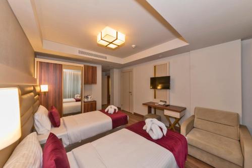 Habitación Familiar Connection del hotel Golden Royal and Spa. Foto 6