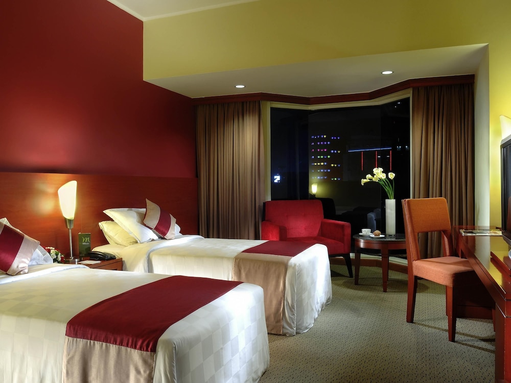 Habitación superior con 2 camas individuales del hotel Mercure Jakarta Kota