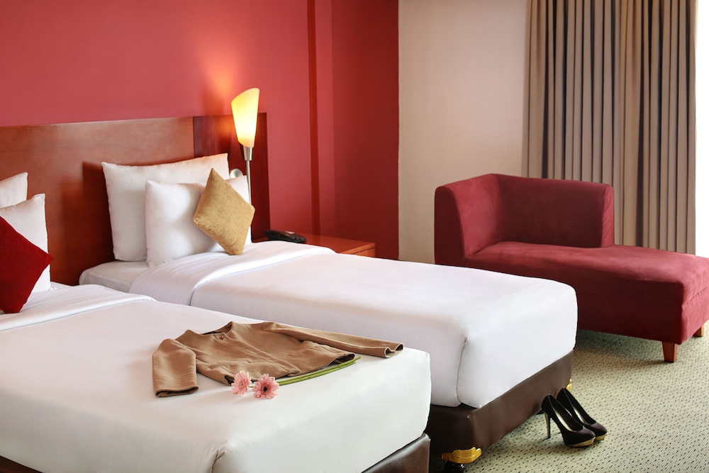Deluxe con 1 cama doble del hotel Mercure Jakarta Kota. Foto 1