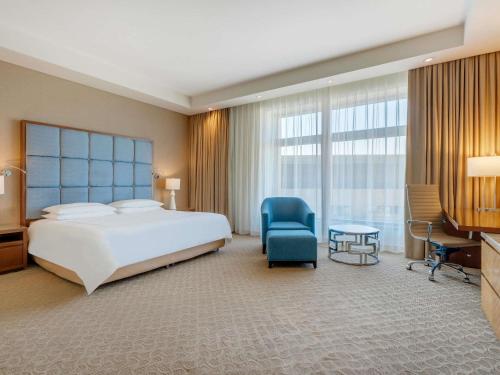 Habitación Familiar del hotel Swissotel Al Ghurair. Foto 1