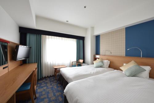 Habitación Económica con 2 camas individuales - No fumadores del hotel Granvia Hiroshima. Foto 1