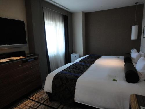 Habitación Doble Deluxe para no fumadores - 2 camas individuales del hotel Granvia Hiroshima. Foto 5