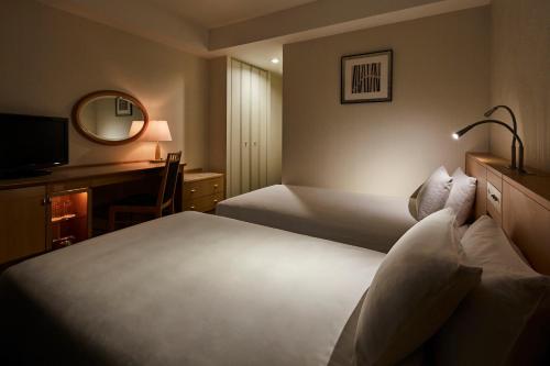 Habitación Económica con 2 camas individuales - No fumadores del hotel Tobu Levant Tokyo. Foto 4