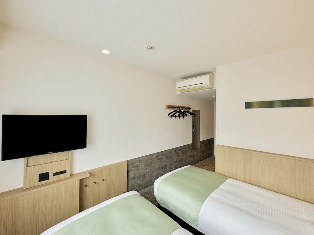 Habitación con 2 camas individuales, no fumadores del hotel Villa Fontaine Tokyo - Otemachi. Foto 1