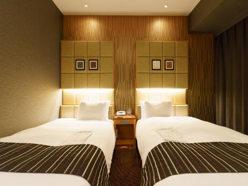 Habitación Doble - No fumadores - 2 camas del hotel Sotetsu Fresa Inn Higashi Shinjuku. Foto 1