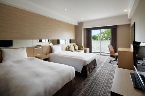 Habitación Doble Estándar - 2 camas - No fumadores del hotel Grand Prince Hotel Shin Takanawa. Foto 3