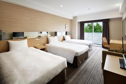 Habitación Triple Estándar - No fumadores del hotel Grand Prince Hotel Shin Takanawa. Foto 3