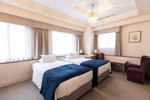 Habitación Esquinera con 2 camas individuales - No Fumadores del hotel Rose Garden Shinjuku