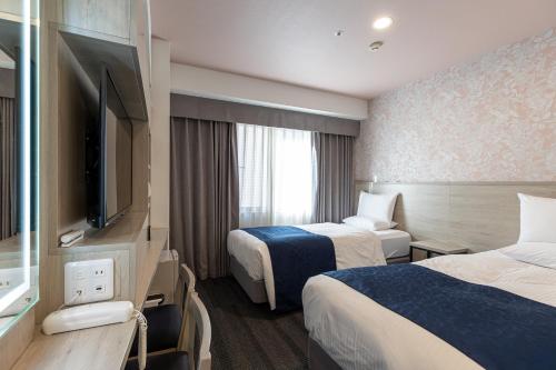 Habitación Doble Confort para no fumadores - 2 camas del hotel Rose Garden Shinjuku