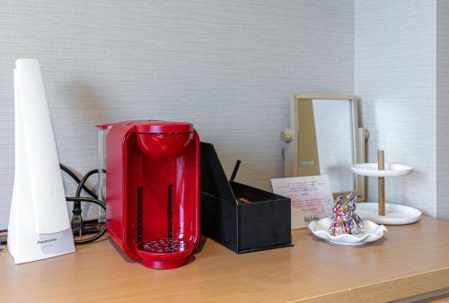 Habitación Doble Deluxe para no fumadores - 2 camas individuales del hotel Rose Garden Shinjuku. Foto 3