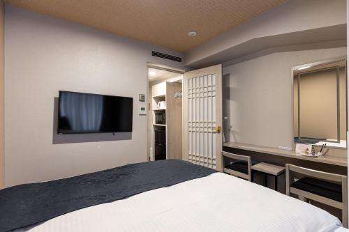 Habitación Doble Confort para no fumadores del hotel Rose Garden Shinjuku. Foto 2
