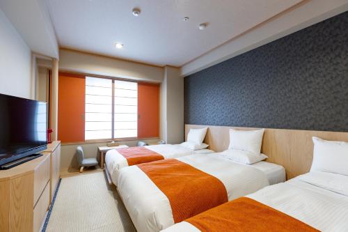 Habitación Triple de estilo japonés - Anexo - No fumadores del hotel Rose Garden Shinjuku. Foto 3