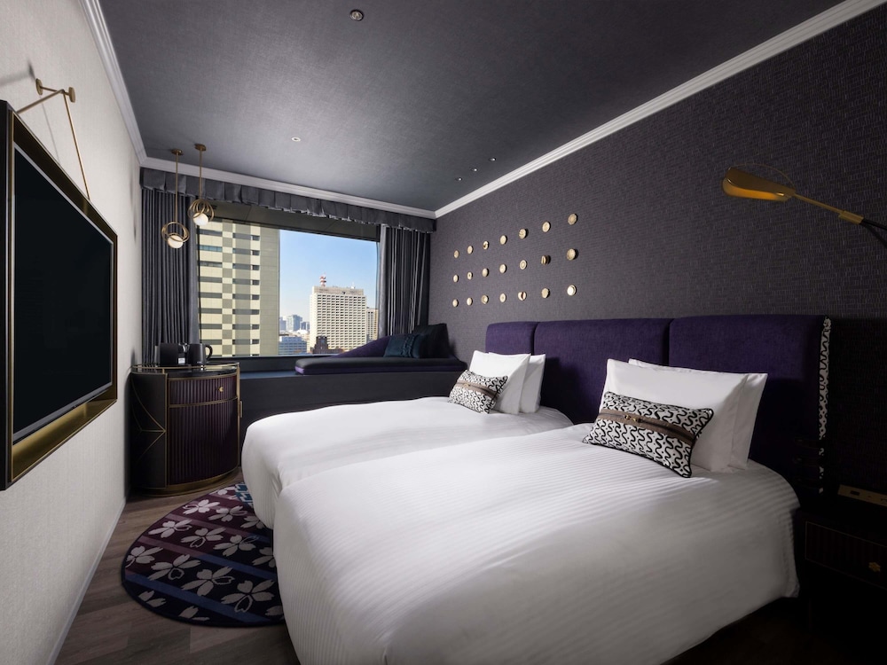 Habitación superior con 2 camas individuales del hotel Mercure Tokyo Hibiya. Foto 4