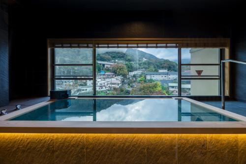 Habitación especial japonés - occidental con baño interior y vistas al río del hotel Kajikaso