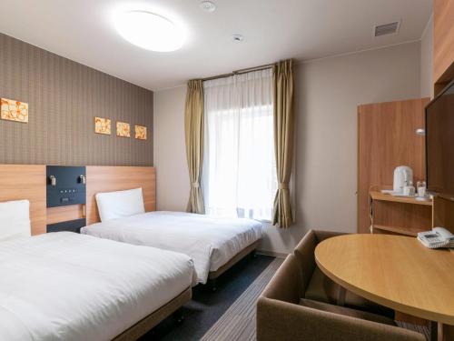Habitación Doble Estándar - 2 camas - No fumadores del hotel Comfort Osaka Shinsaibashi. Foto 1