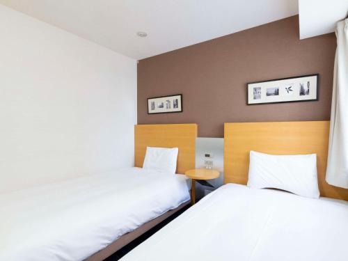 Habitación Económica con 2 camas individuales - No fumadores del hotel Comfort Osaka Shinsaibashi. Foto 2