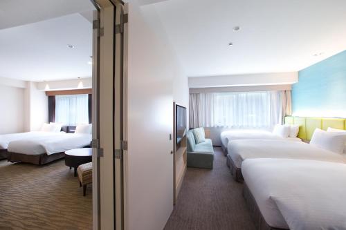 Habitación Cuádruple - No fumadores del hotel Holiday Inn Osaka Namba. Foto 4