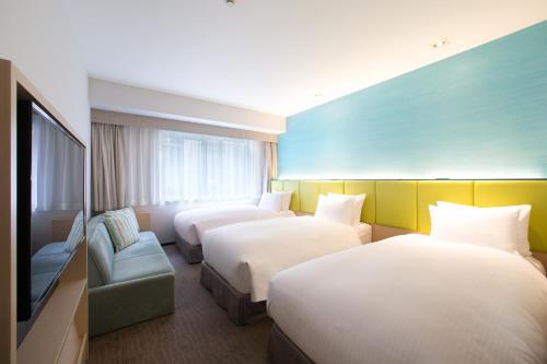 Habitación Cuádruple Económica - No fumadores del hotel Holiday Inn Osaka Namba. Foto 8