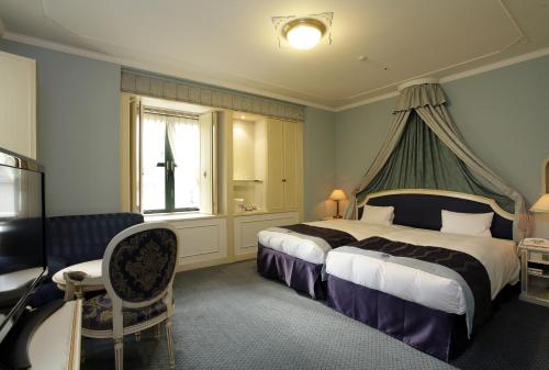 Donau Classic Hollywood Twin Room - Non - Smoking del hotel Monterey Osaka. Foto 1
