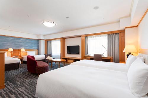 Habitación Cuádruple Business Class - No fumadores del hotel Nikko Kansai Airport. Foto 4