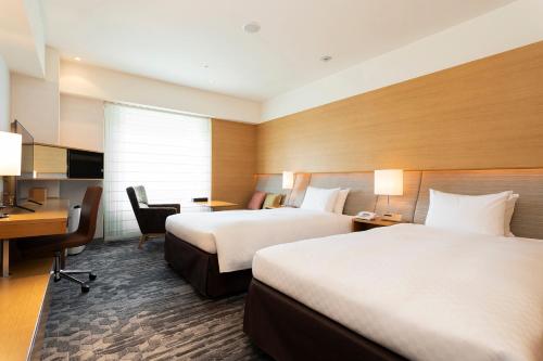 Habitación Business Class con 2 camas individuales - No fumadores del hotel Nikko Kansai Airport. Foto 2