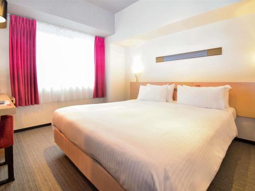 Habitación Estándar con cama grande - No fumadores del hotel Ibis Styles Kyoto Station. Foto 13