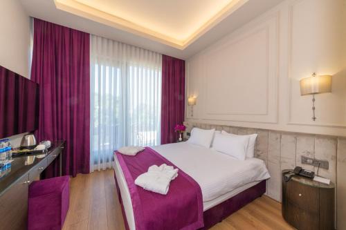 Habitación Confort con balcón y vistas a la ciudad del hotel The Beyaz Saray and Spa. Foto 2