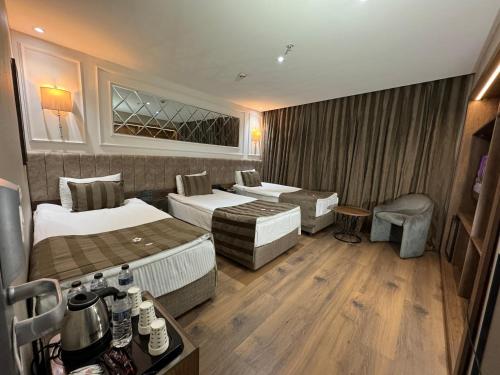 Habitación Triple Estándar con vistas al atrio del hotel The Beyaz Saray and Spa. Foto 5