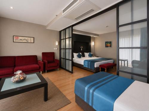 Suite Familiar con vistas a la ciudad del hotel The Beyaz Saray and Spa. Foto 3