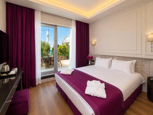 Habitación Confort con balcón y vistas a la ciudad del hotel The Beyaz Saray and Spa. Foto 2