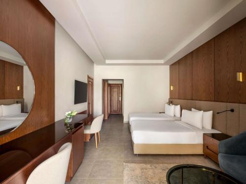 Habitación Premier con 2 camas individuales del hotel Movenpick Cairo Media City