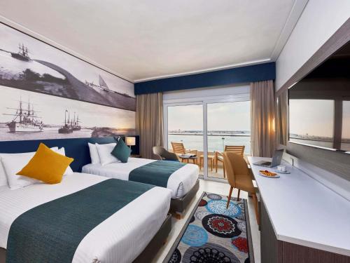 Habitación Privilege, balcón, vistas al lago - 2 camas individuales del hotel Mercure Ismailia Forsan Island. Foto 3