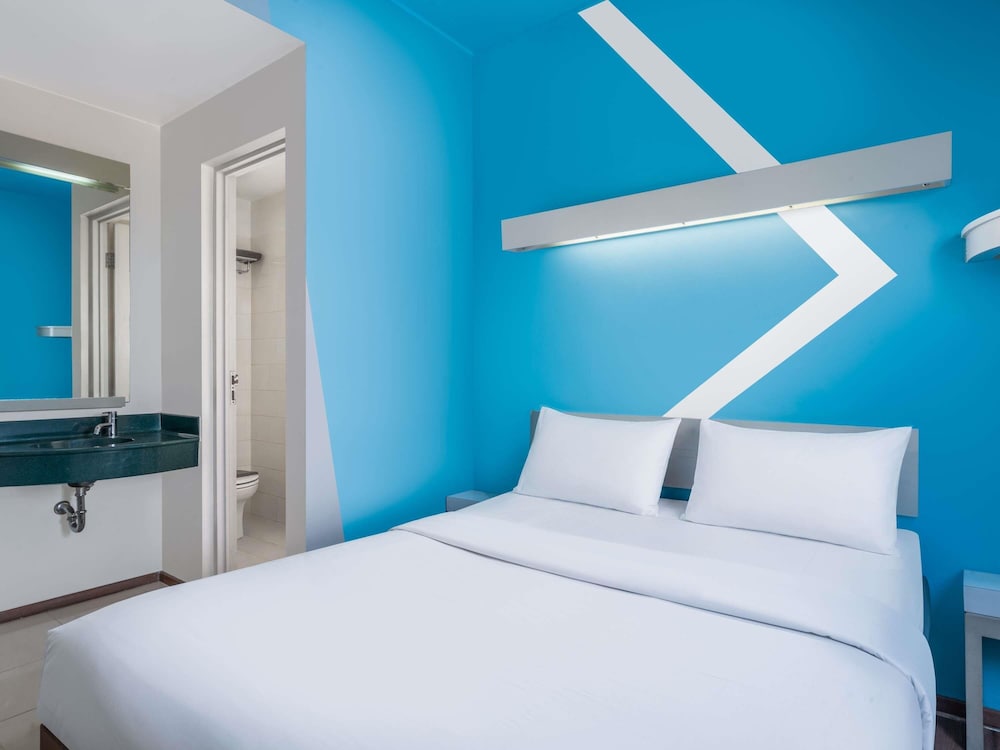1 cama queen del hotel Ibis Budget Jakarta Menteng