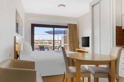Apartamento Estudio con vistas a la piscina del hotel Hilton Vacation Club Royal Sunset Beach Club Tenerife. Foto 1