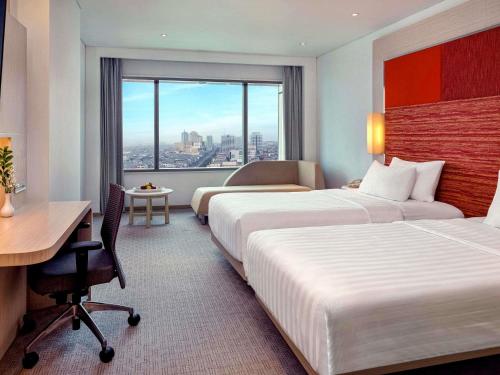 Grand Deluxe con 2 Camas Individuales del hotel Grand Mercure Jakarta Harmoni