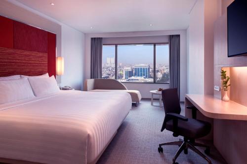Grand Deluxe con 2 Camas Individuales del hotel Grand Mercure Jakarta Harmoni. Foto 5