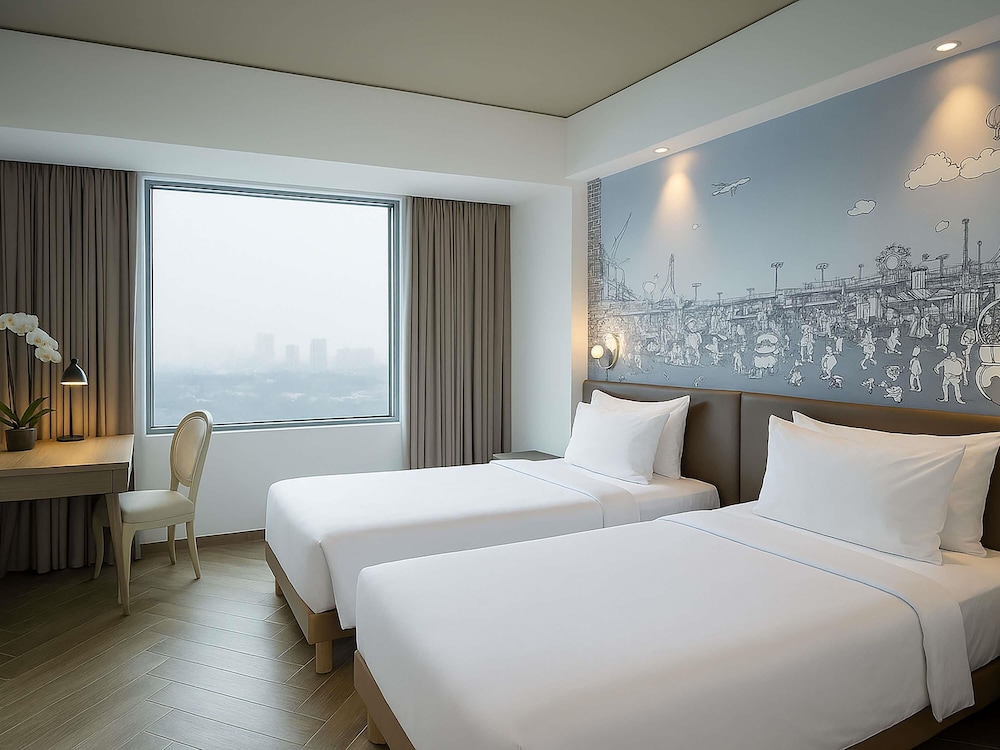 Habitación superior con 2 camas individuales del hotel Mercure Jakarta Simatupang