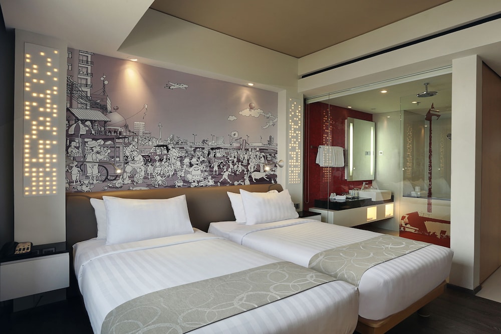 Habitación superior con 2 camas individuales del hotel Mercure Jakarta Simatupang. Foto 1